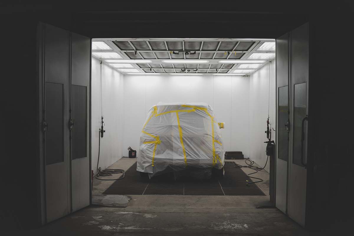 tent vehicle covered by white in garrage boston
